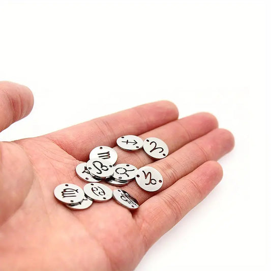 Round Cut Out Zodiac Signs on a Silver Plate